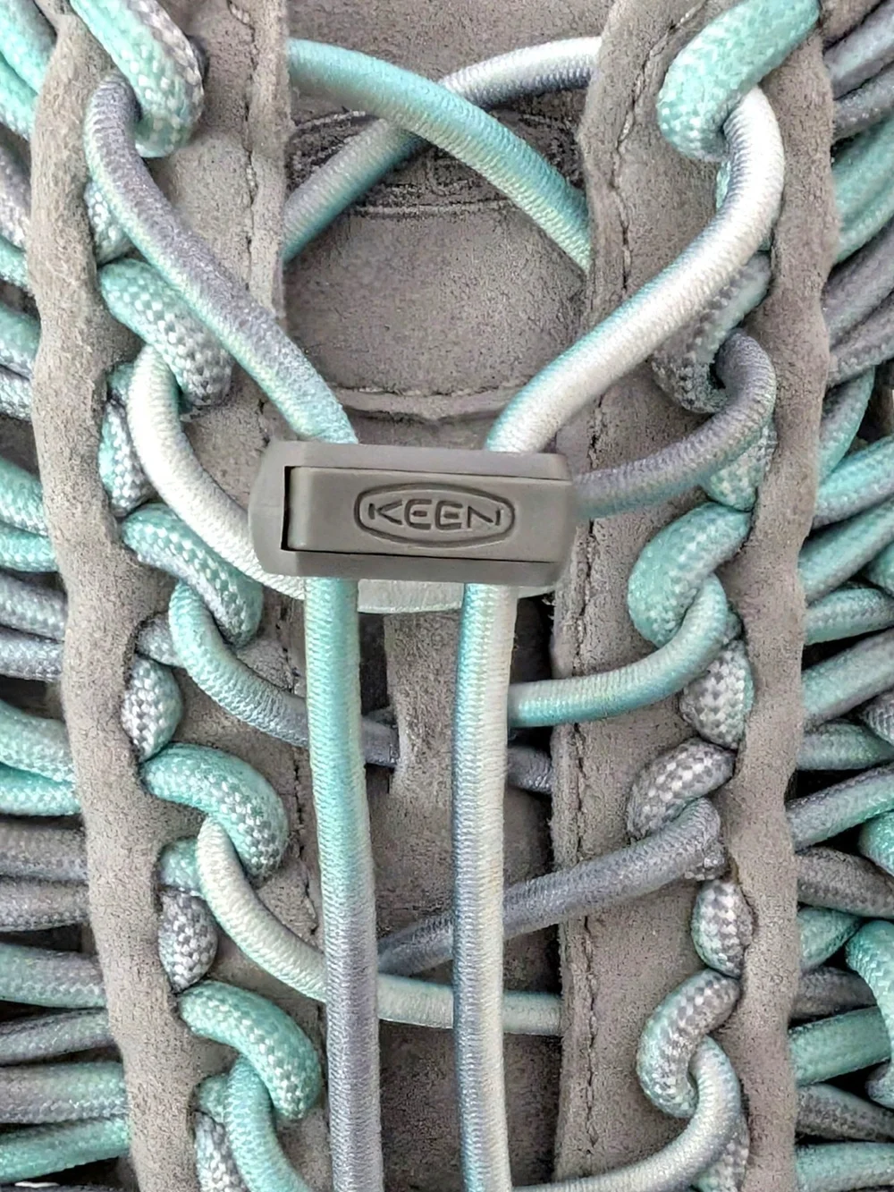 NWOT KEEN Women's Uneek open-air cord sandals in a grey and aqua blue colorway